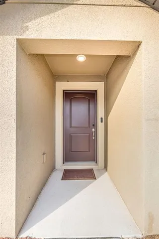 a view of a house with a outdoor space and sitting area
