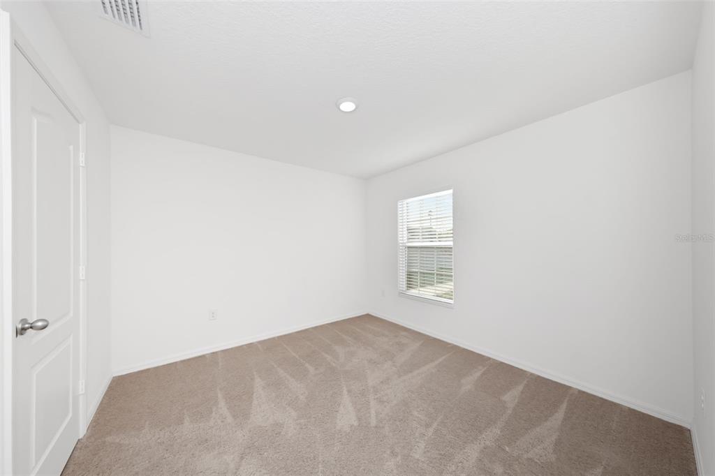 8646 Pinetop Ridge Lane Brooksville, FL 34613 - Photo 32 of 76 a view of empty room