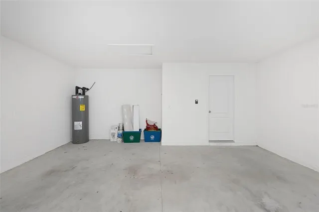 a view of a kitchen with a sink and a stove top oven