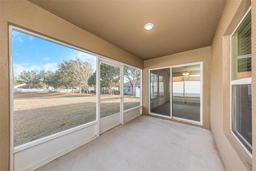 8646 Pinetop Ridge Lane Brooksville, FL 34613 - Photo 37 of 76 a view of an empty room and window