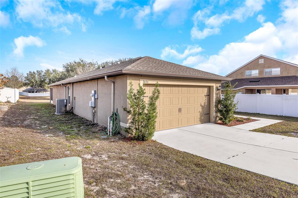 8646 Pinetop Ridge Lane Brooksville, FL 34613 - Photo 4 of 76 a view of a house with a yard