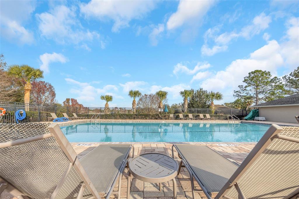 8646 Pinetop Ridge Lane Brooksville, FL 34613 - Photo 45 of 76 a view of a terrace with furniture and stove