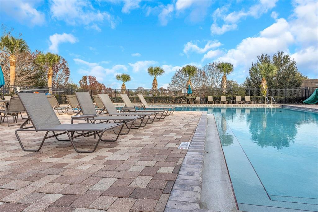 8646 Pinetop Ridge Lane Brooksville, FL 34613 - Photo 47 of 76 a view of a lake with chairs