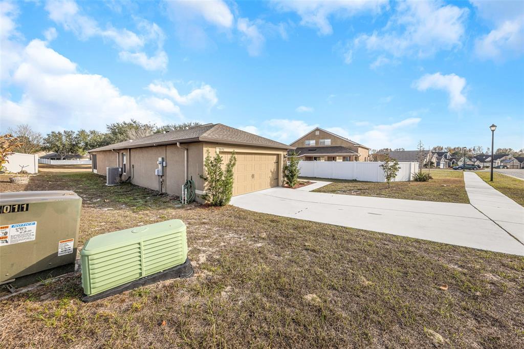 8646 Pinetop Ridge Lane Brooksville, FL 34613 - Photo 5 of 76 a view of a house with a outdoor space and sitting area