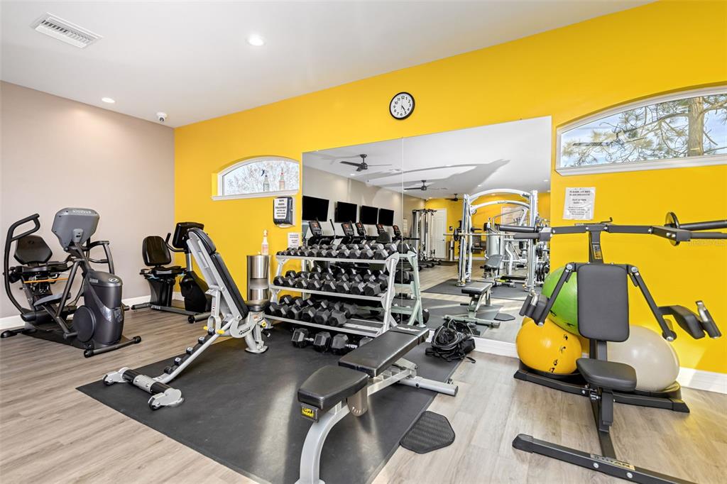 8646 Pinetop Ridge Lane Brooksville, FL 34613 - Photo 52 of 76 a view of a room with gym equipment