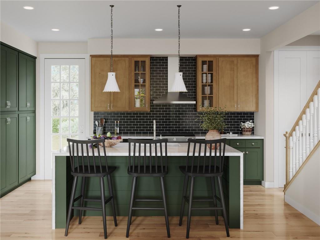 902 Reeb Way Cranberry Township, PA 16066 - Photo 3 of 31 a kitchen with a table chairs and a refrigerator