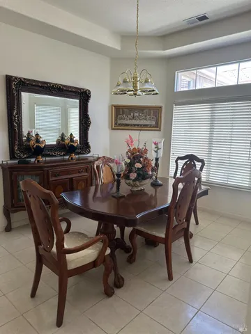 a view of a dining room with furniture