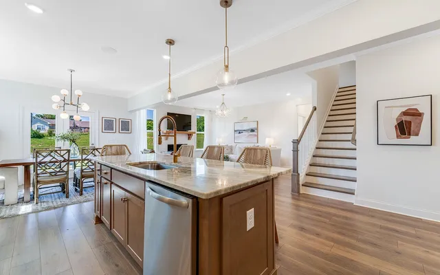 a kitchen with sink and center island