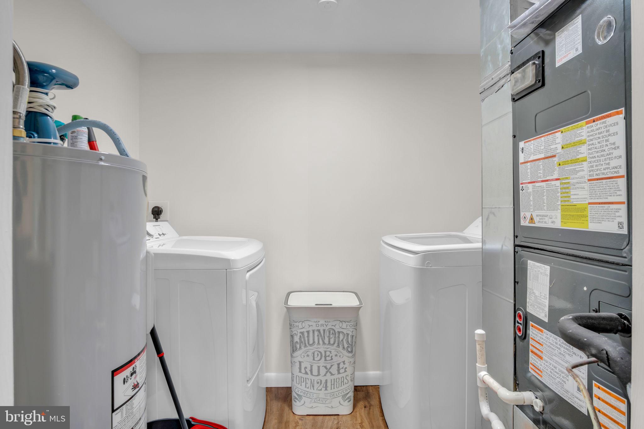 14 Ramsgate Court, Unit 14 York, PA 17404 - Photo 13 of 25 Modern laundry space with sleek appliances.