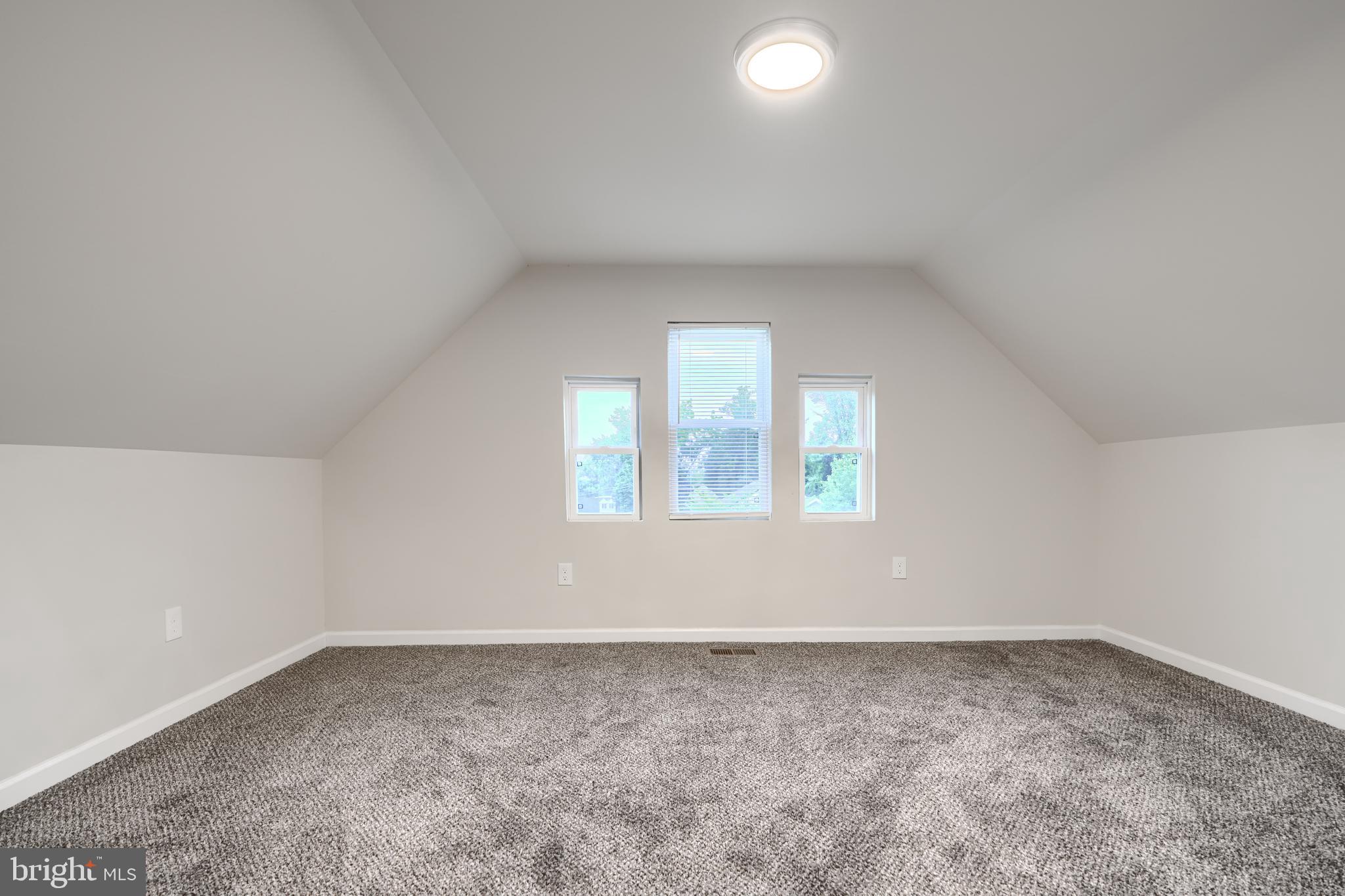 3308 Walbrook Avenue Baltimore, MD 21216 - Photo 30 of 32 an empty room with a window
