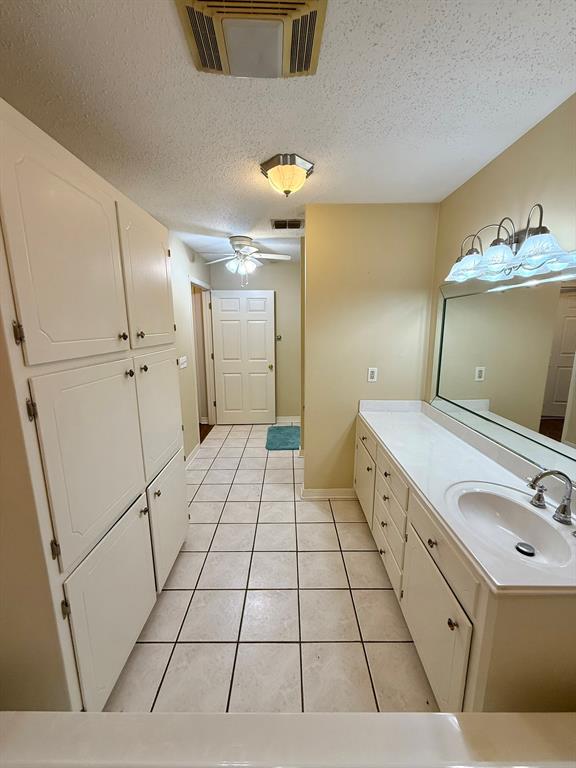 11535 Timber Ridge Drive Keithville, LA 71047 - Photo 13 of 39 a bathroom with a sink and a mirror
