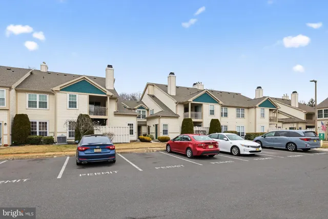 a car parked in front of a house