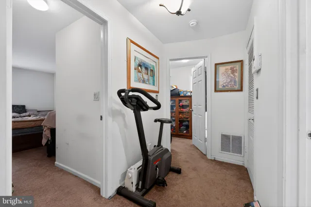 a view of a room with gym equipment