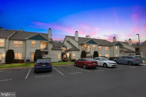 a car parked in front of a house