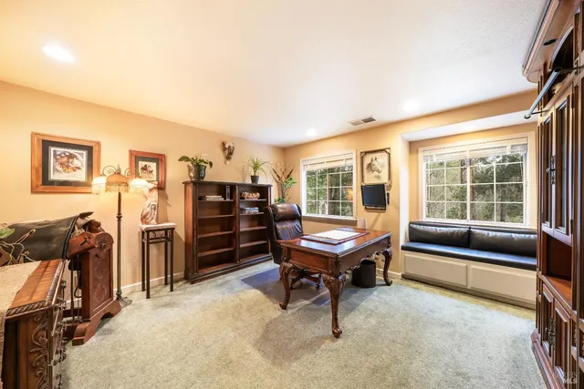 a kitchen with a sink and a stove top oven