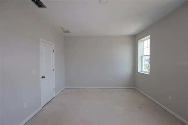 an empty room with a window