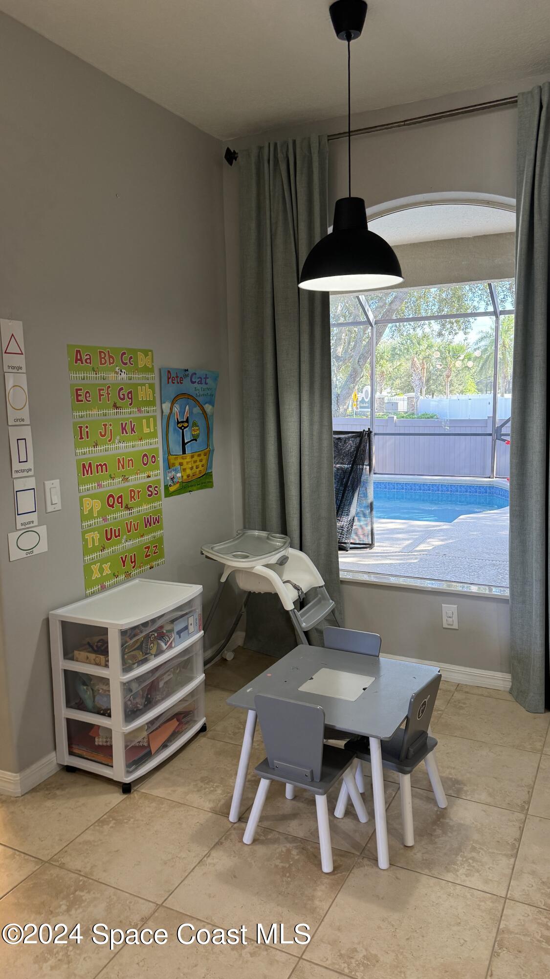 1471 Tamango Drive Melbourne, FL 32904 - Photo 11 of 23 a bedroom with furniture and a window