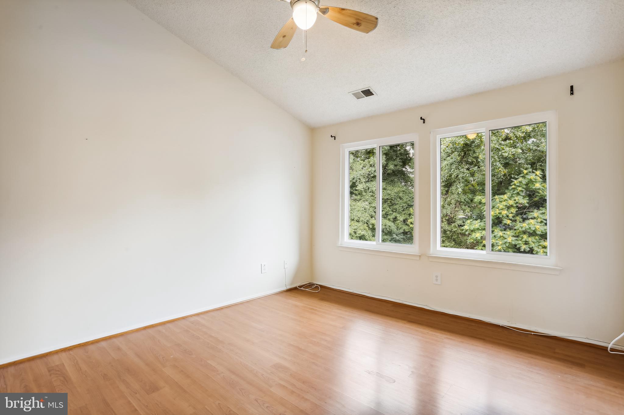 11719 E Summerchase Circle, Unit 1719E Reston, VA 20194 - Photo 13 of 26 an empty room with a window