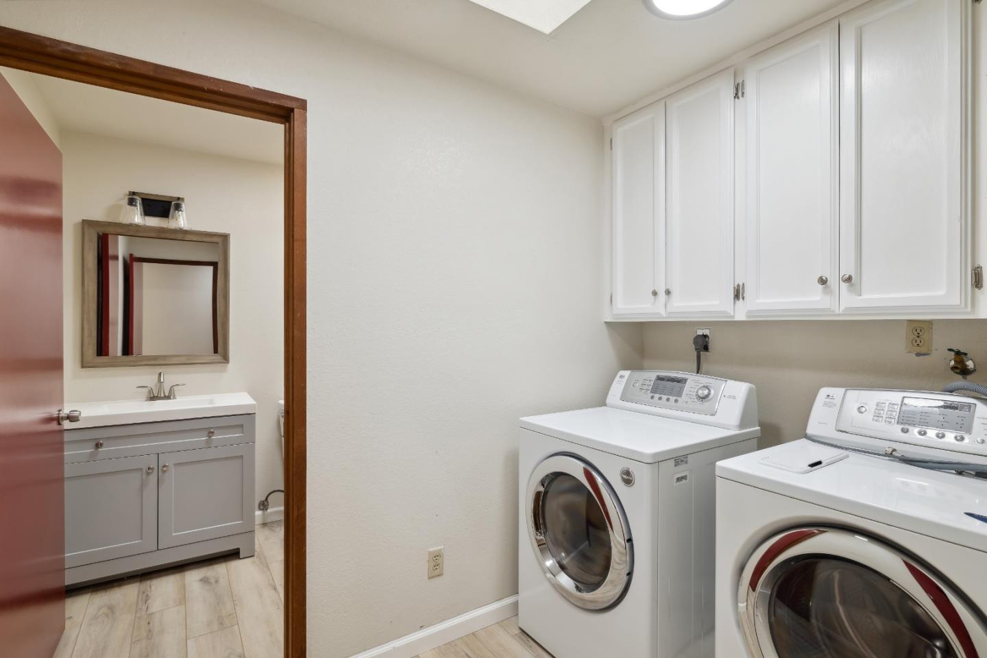 10845 Vineland Road Ben Lomond, CA 95005 - Photo 13 of 77 a utility room with sink dryer and washer
