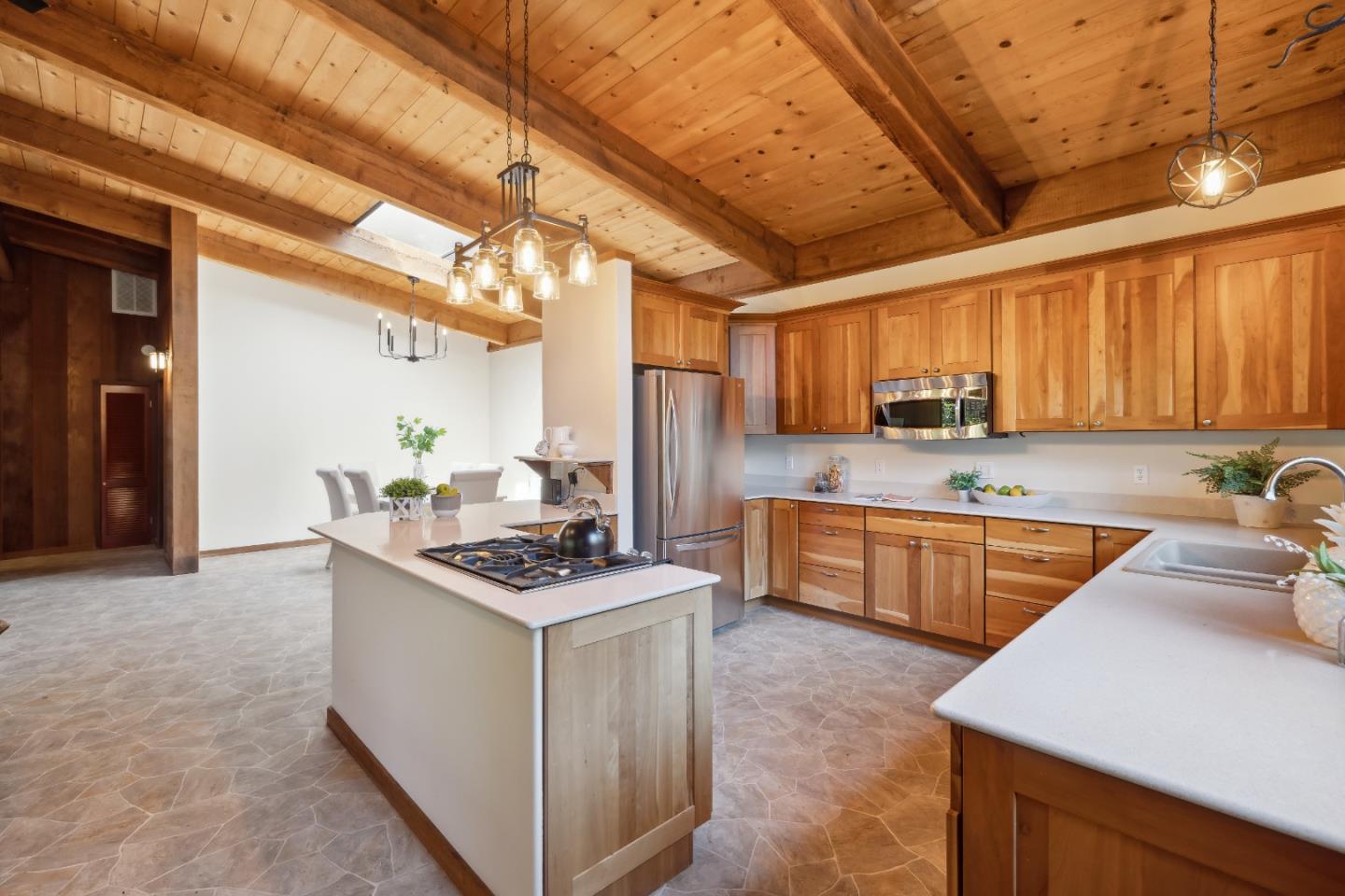 10845 Vineland Road Ben Lomond, CA 95005 - Photo 18 of 77 a kitchen with stainless steel appliances granite countertop wooden cabinets a stove top oven a sink and dishwasher