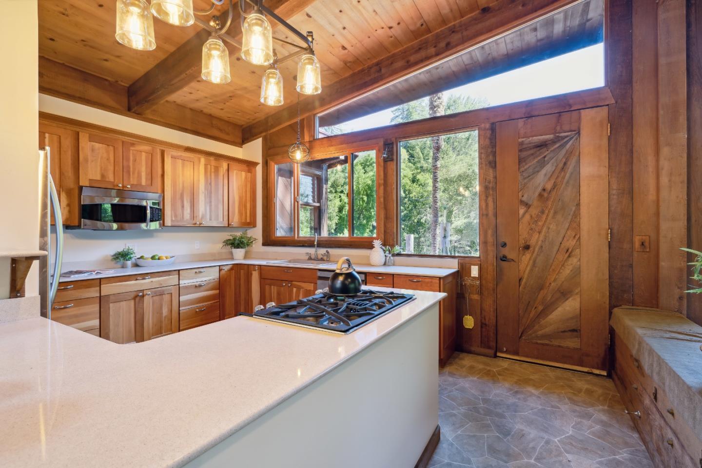 10845 Vineland Road Ben Lomond, CA 95005 - Photo 19 of 77 a kitchen with stainless steel appliances granite countertop sink stove top oven and cabinets