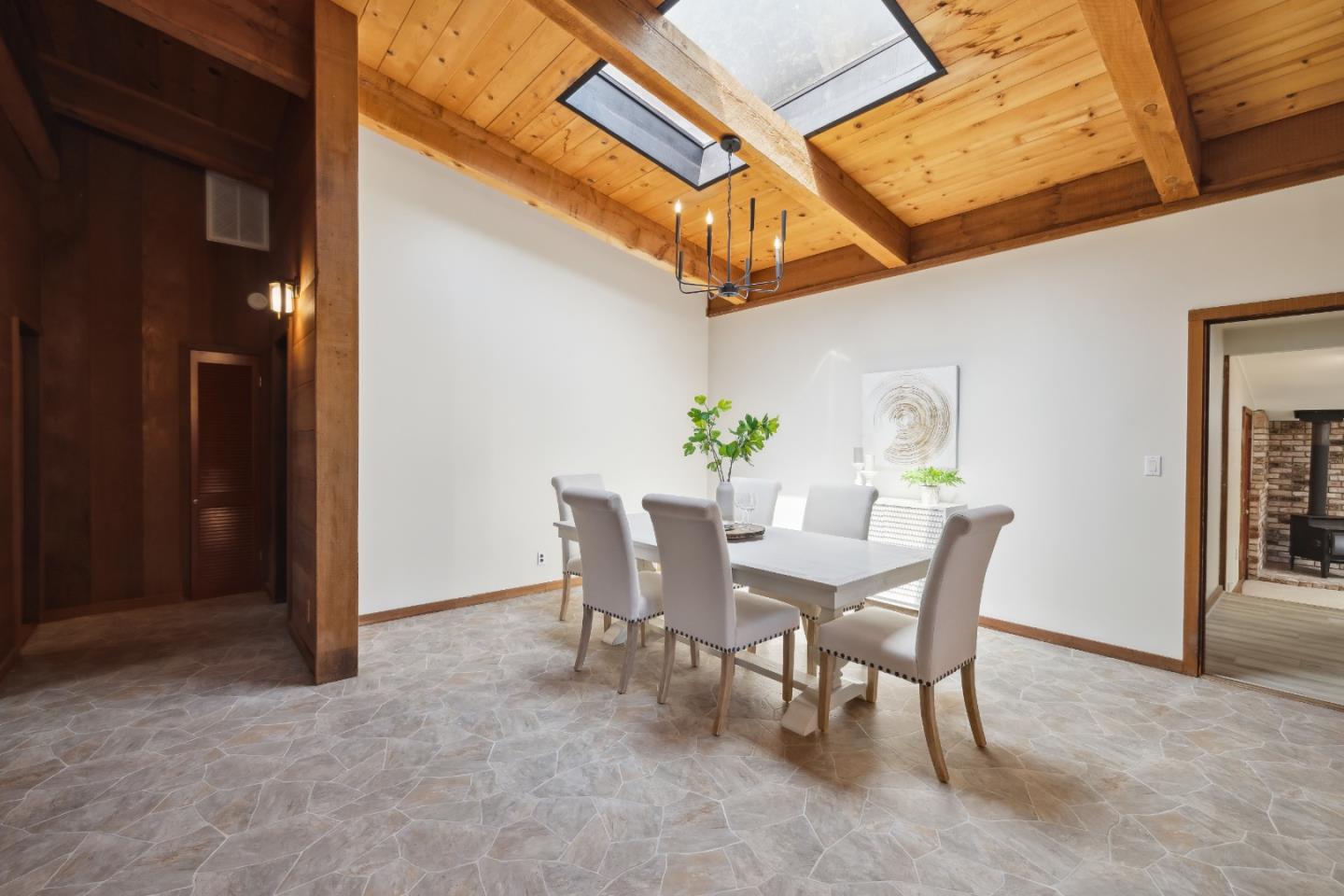 10845 Vineland Road Ben Lomond, CA 95005 - Photo 21 of 77 a view of a dining room with furniture and a chandelier