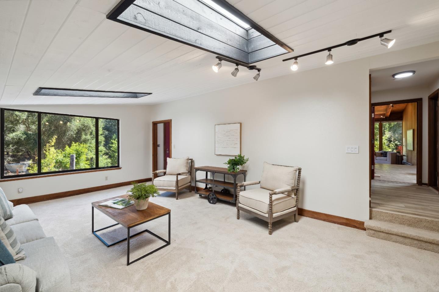10845 Vineland Road Ben Lomond, CA 95005 - Photo 24 of 77 a living room with furniture and a window