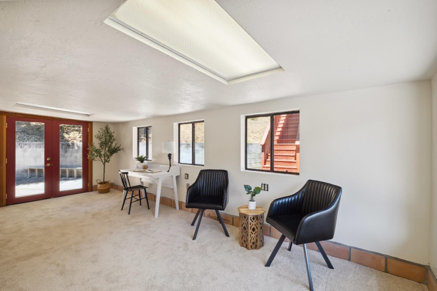 10845 Vineland Road Ben Lomond, CA 95005 - Photo 36 of 77 a living room with furniture and a window
