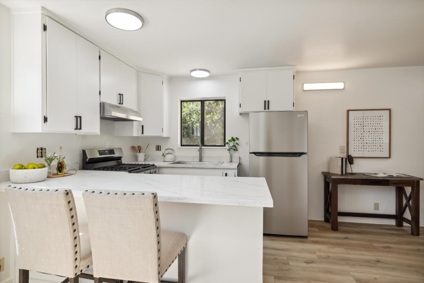 10845 Vineland Road Ben Lomond, CA 95005 - Photo 38 of 77 a kitchen with a sink a refrigerator and a stove top oven