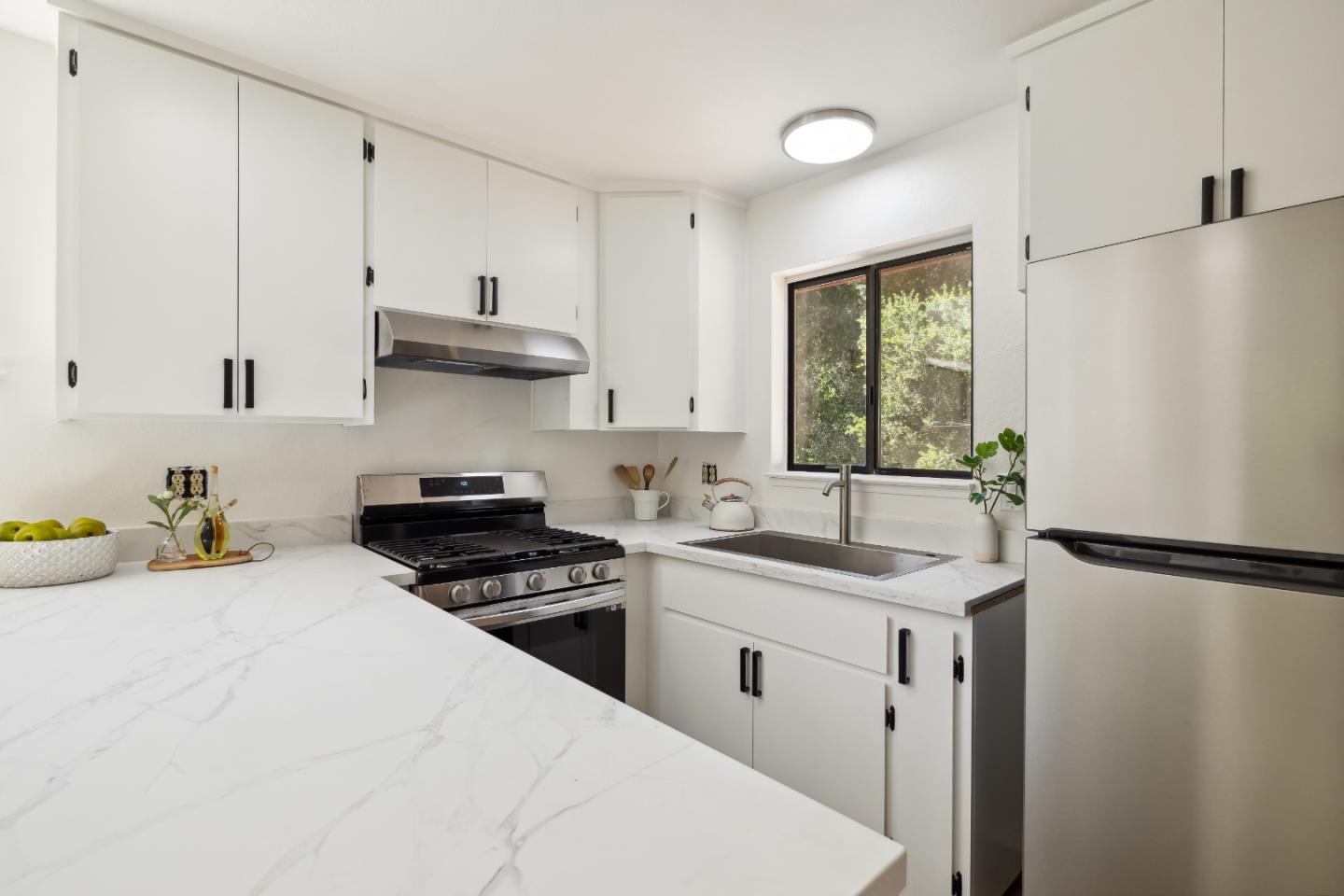 10845 Vineland Road Ben Lomond, CA 95005 - Photo 39 of 77 a kitchen with stainless steel appliances granite countertop a sink stove and refrigerator