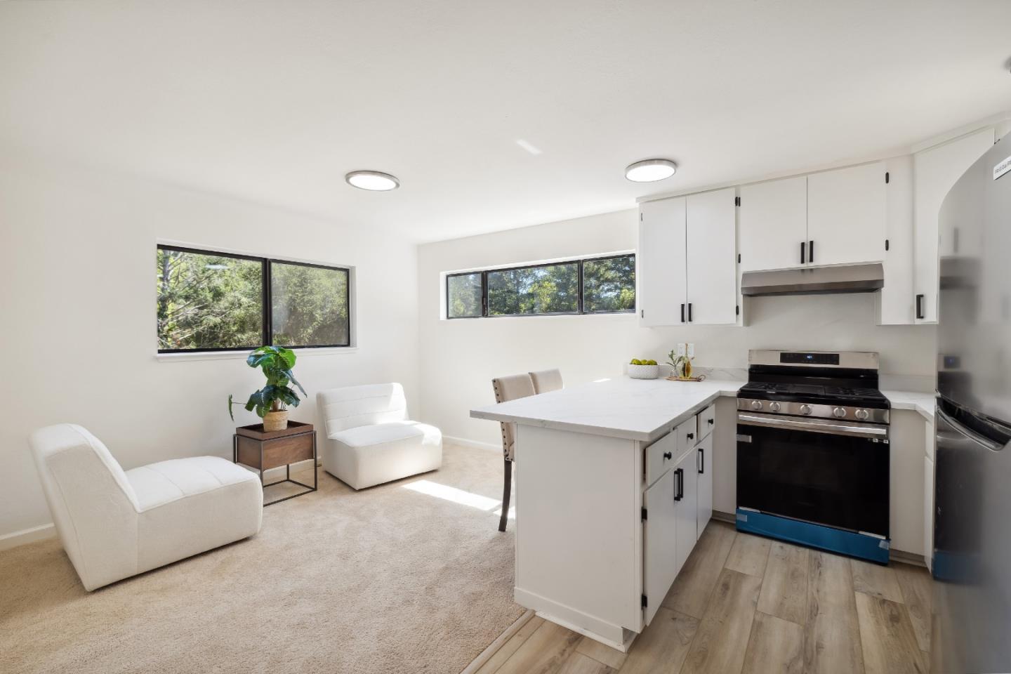 10845 Vineland Road Ben Lomond, CA 95005 - Photo 40 of 77 a kitchen with a stove cabinets and living room view
