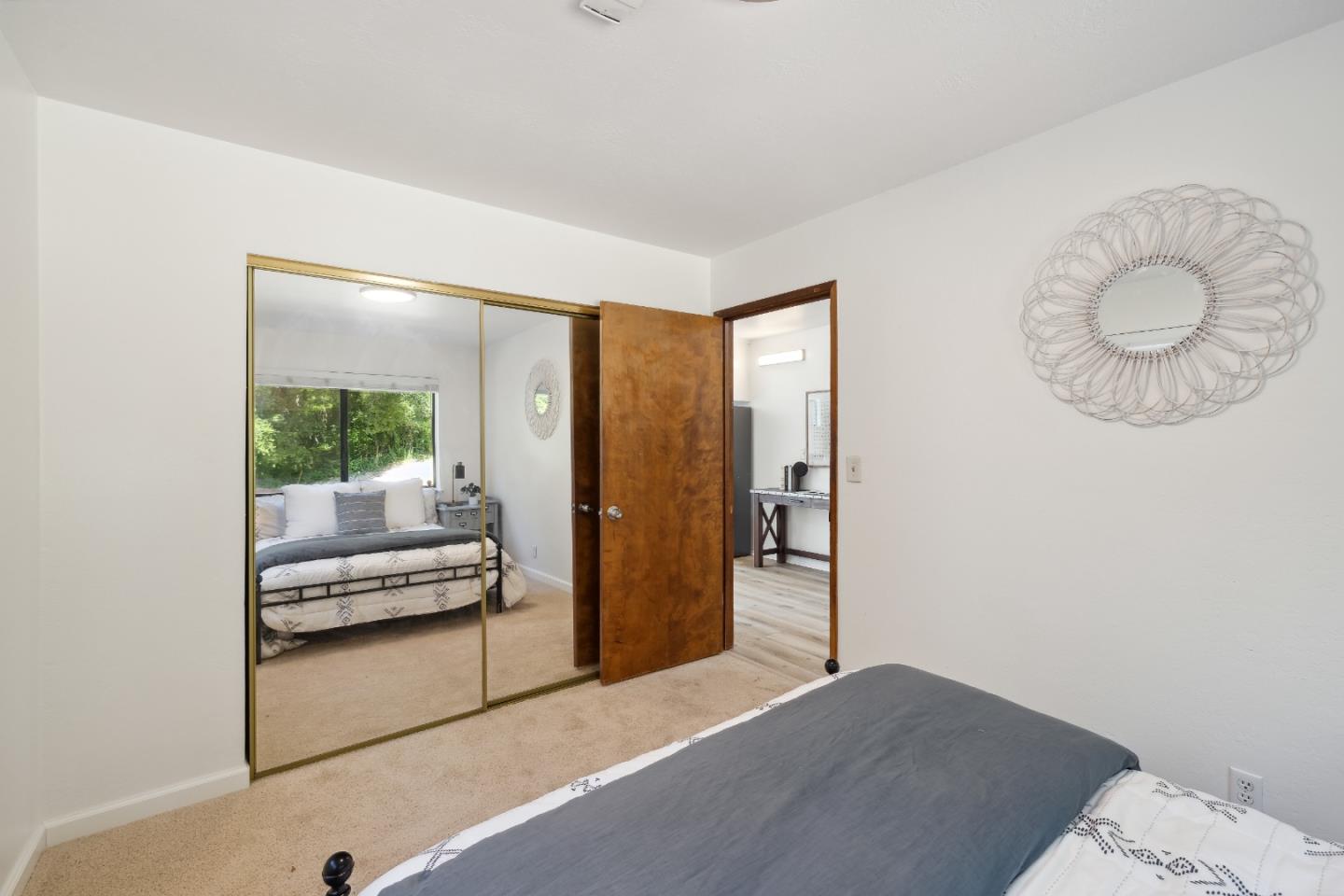 10845 Vineland Road Ben Lomond, CA 95005 - Photo 44 of 77 a bedroom with a bed and a window