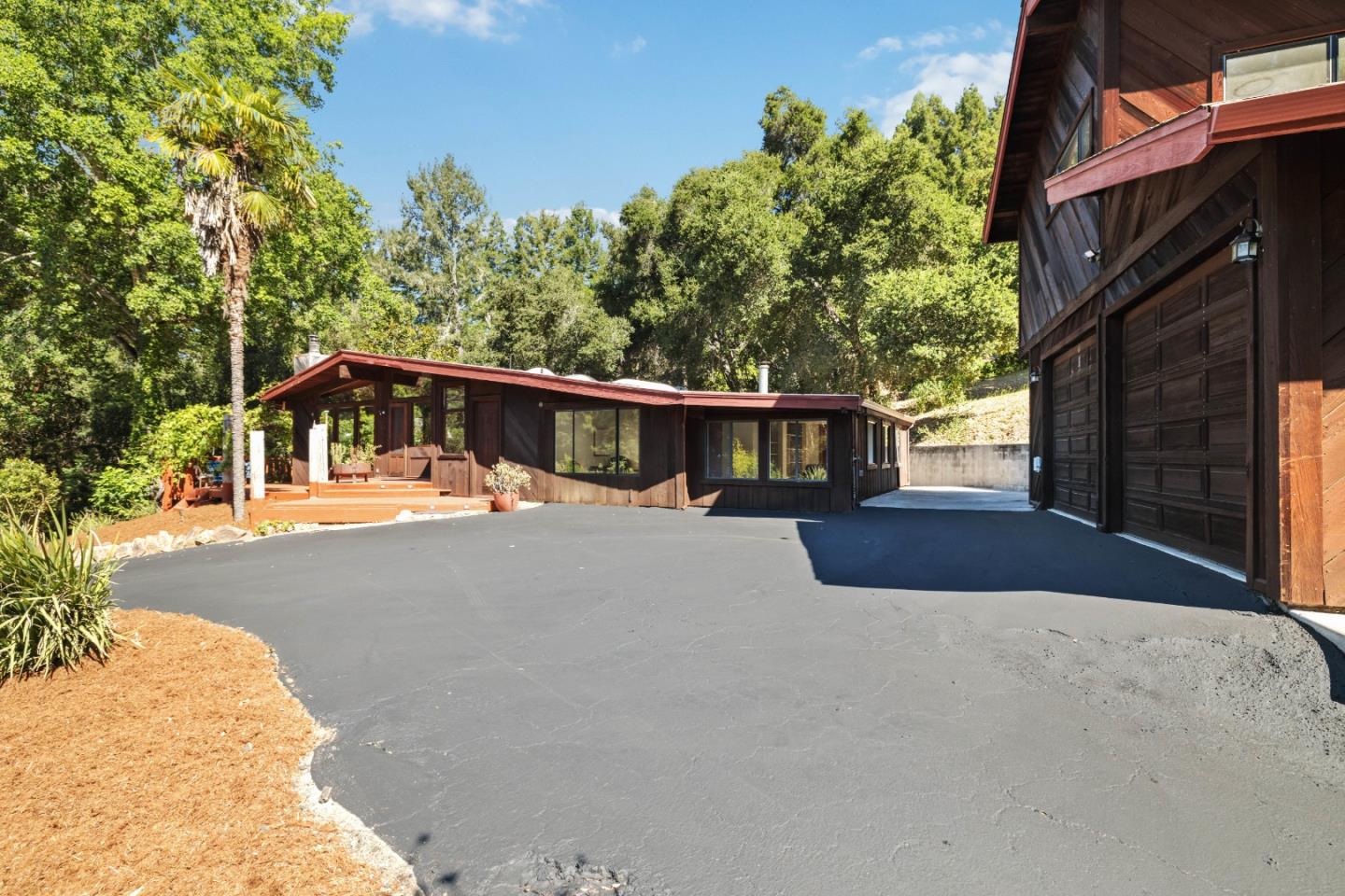 10845 Vineland Road Ben Lomond, CA 95005 - Photo 48 of 77 a view of a house with a swimming pool