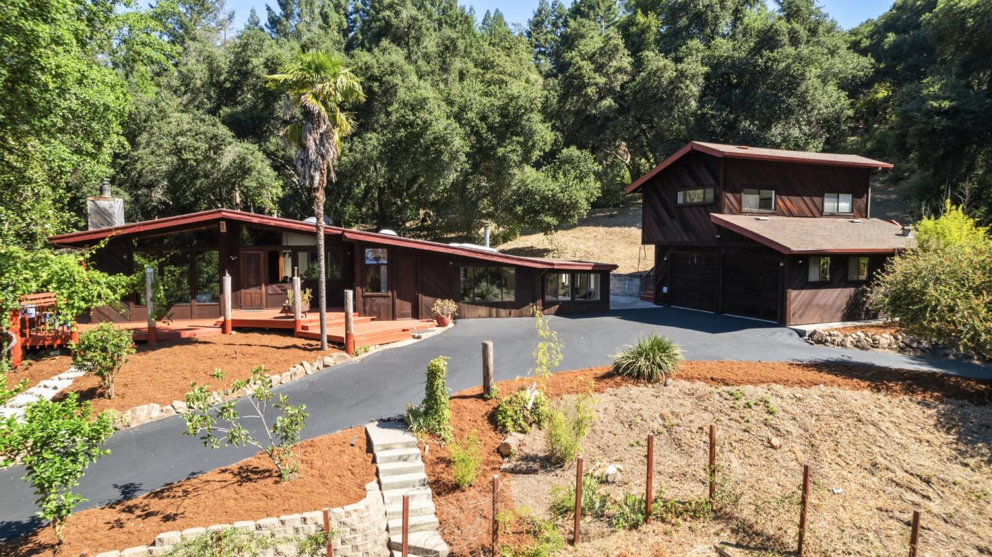 10845 Vineland Road Ben Lomond, CA 95005 - Photo 52 of 77 a view of a swimming pool with a patio