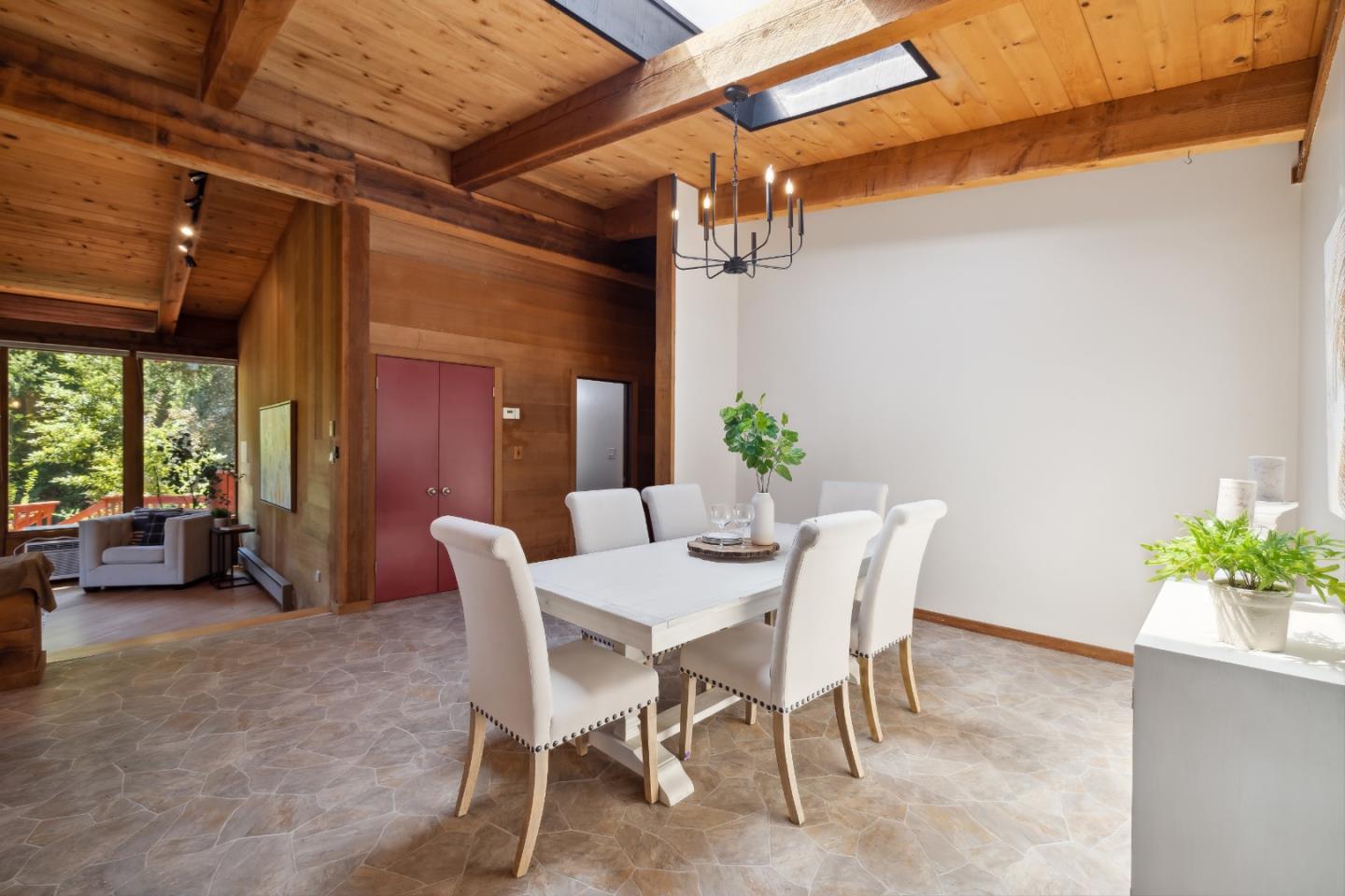 10845 Vineland Road Ben Lomond, CA 95005 - Photo 9 of 77 a view of a dining room with furniture and a potted plant