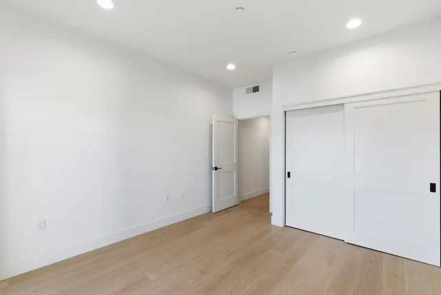 a view of a balcony with city view