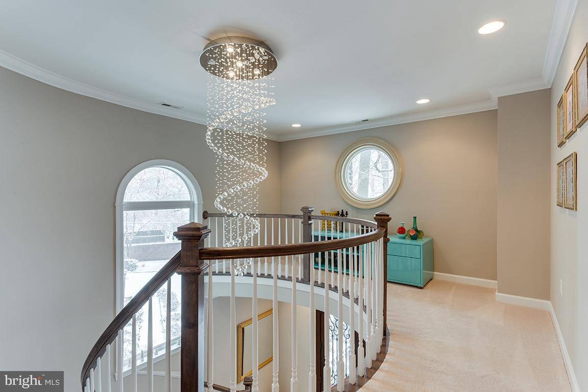 5618 Greentree Road Bethesda, MD 20817 - Photo 23 of 32 Lovely fixture above curved staircase