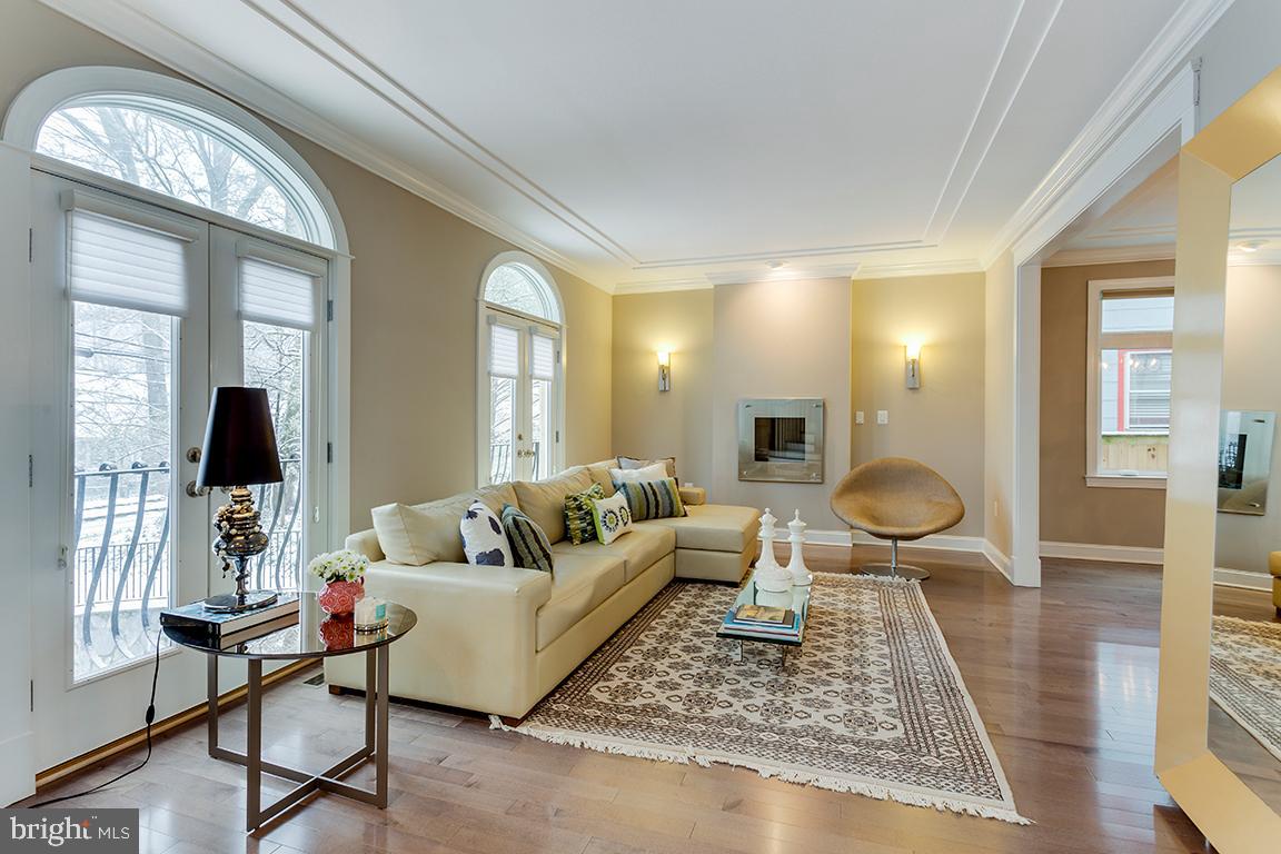 5618 Greentree Road Bethesda, MD 20817 - Photo 5 of 32 Living room w fireplace and Juliette balconies