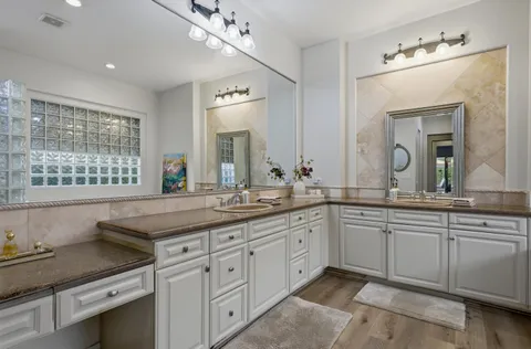 a bathroom with sink and a bathtub