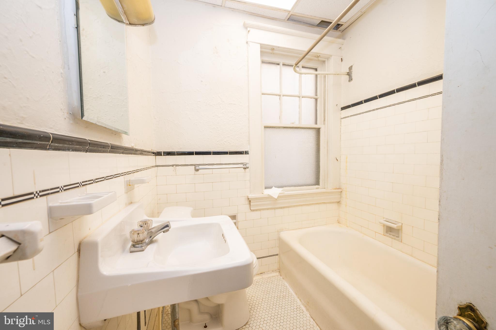6306 Frederick Road Catonsville, MD 21228 - Photo 7 of 36 Full bath (main level)