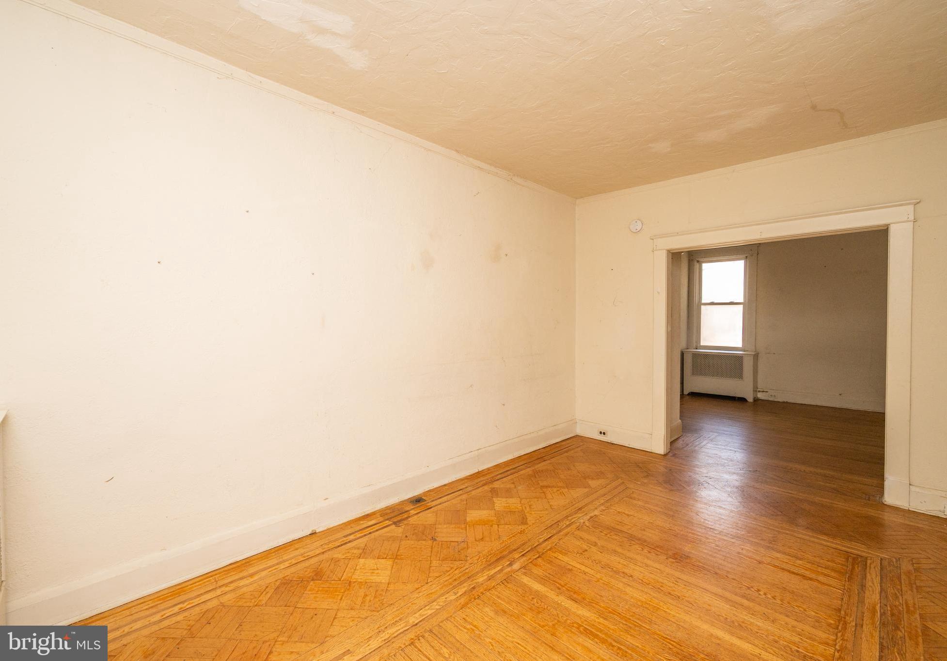 6306 Frederick Road Catonsville, MD 21228 - Photo 10 of 36 Living room looking into dining room (main)