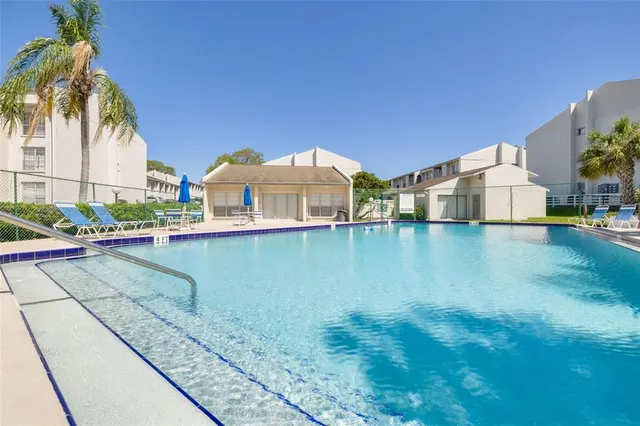 a view of a house with a swimming pool