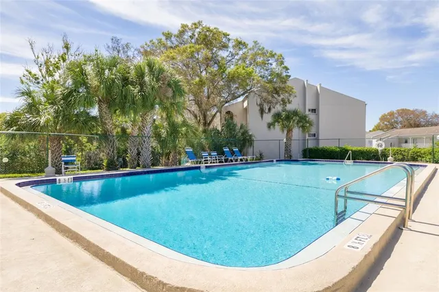 a view of a balcony with wooden floor
