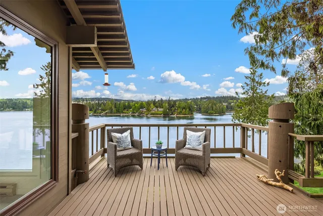 a view of balcony with furniture