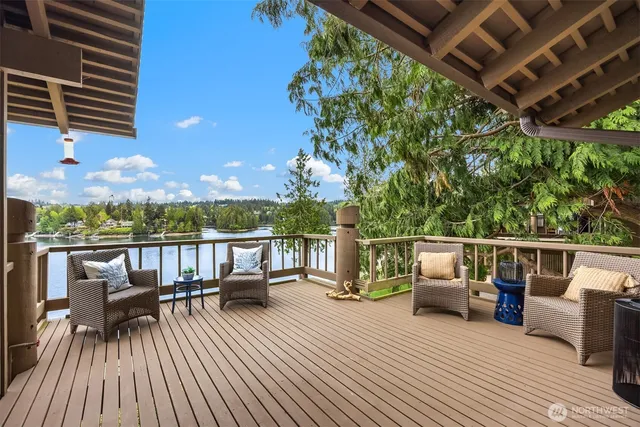 a view of roof deck with patio