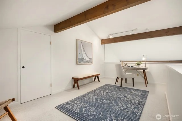 a living room with a rug