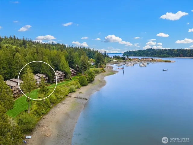 a view of a lake with a swimming pool