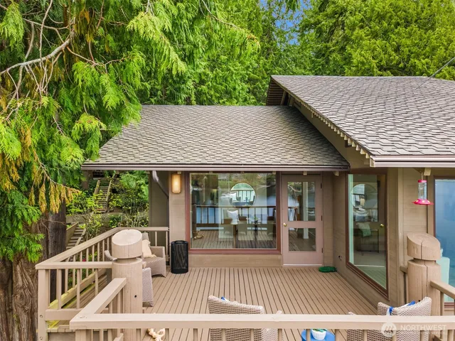swimming pool view with a seating space