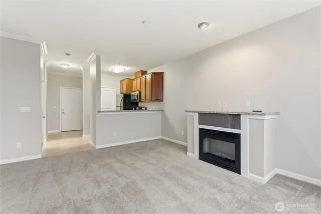 a view of a livingroom with a fireplace and a fireplace