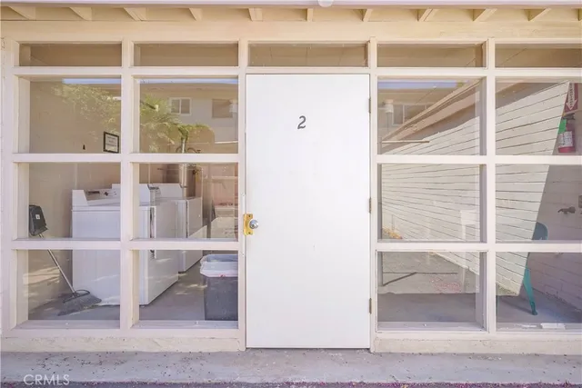 a view of a house with a yard and garage